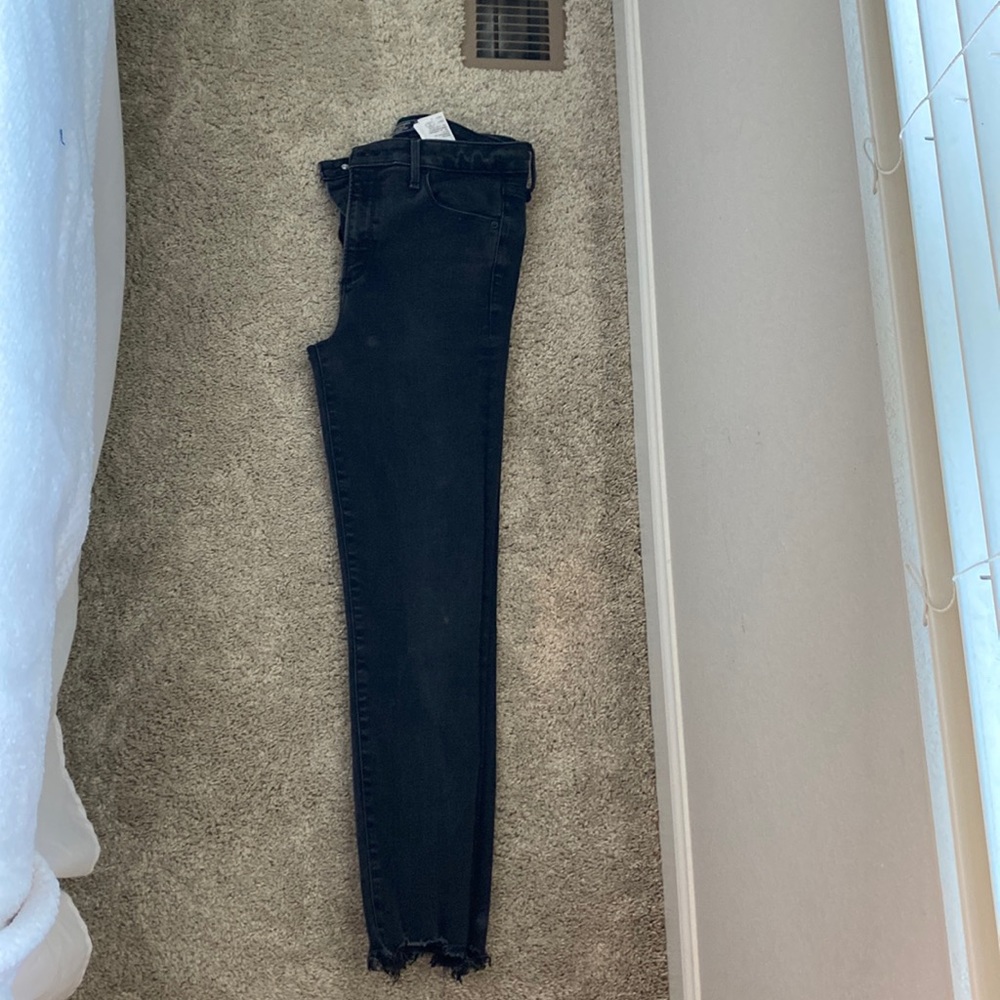 Abercrombie high rise, raw hem black skinny jeans.